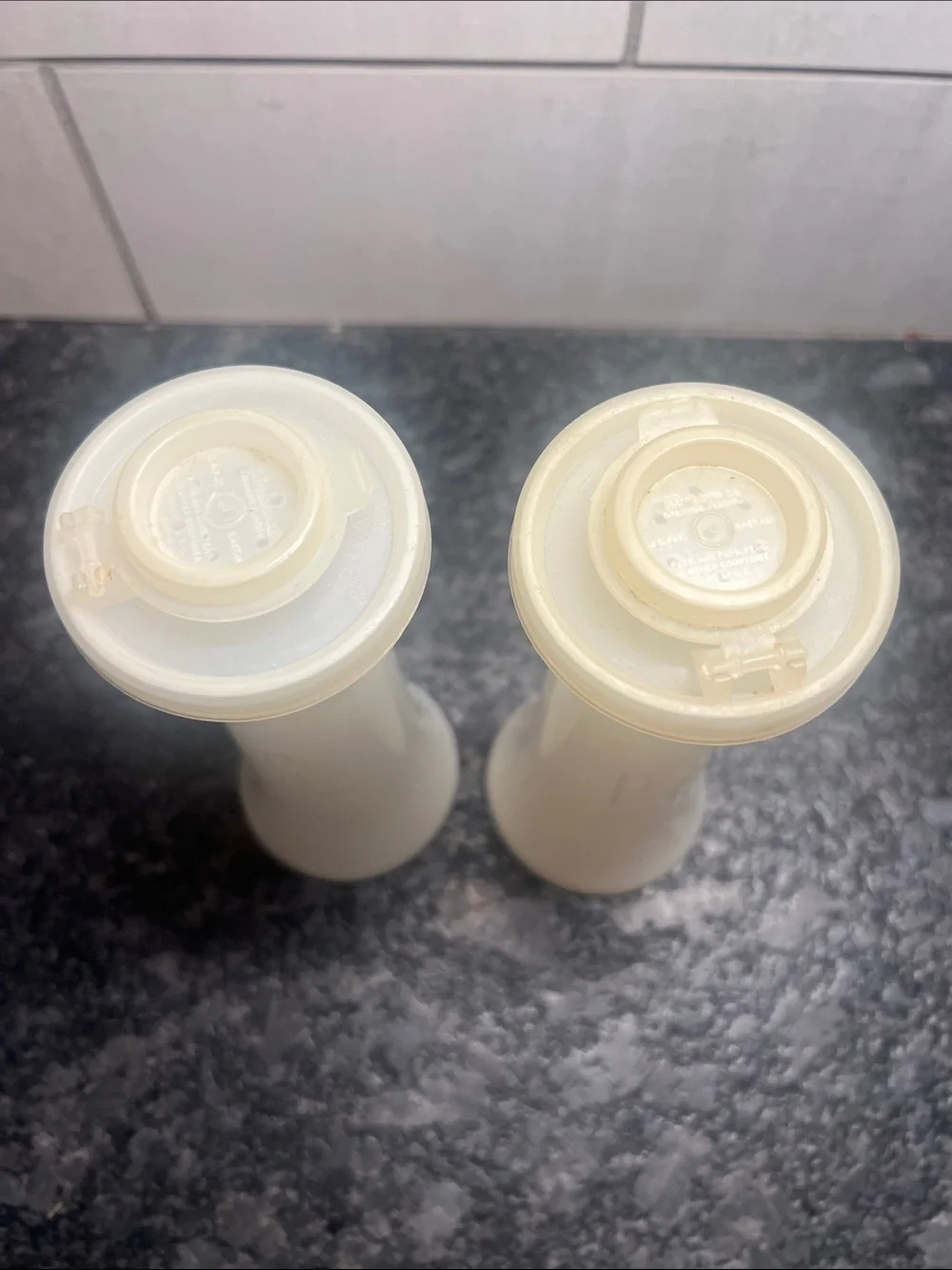 Tupperware White Plastic Salt and Pepper Shakers Set. Great shape